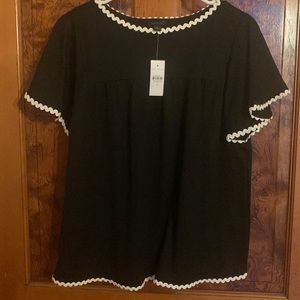 New with tags Black Ann Taylor top with white trim. Loose fit. Size M Very cute!